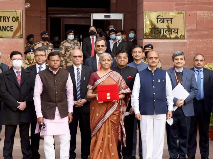 Finance minister Nirmala Sitharaman before leaving North Block to Rashtrapati Bhavan and Parliament House, along with the Ministers of State for Finance, Pankaj Chaowdhary and Dr. Bhagwat Kishanrao Karad and senior officials, to present the Union Budget on Tuesday.