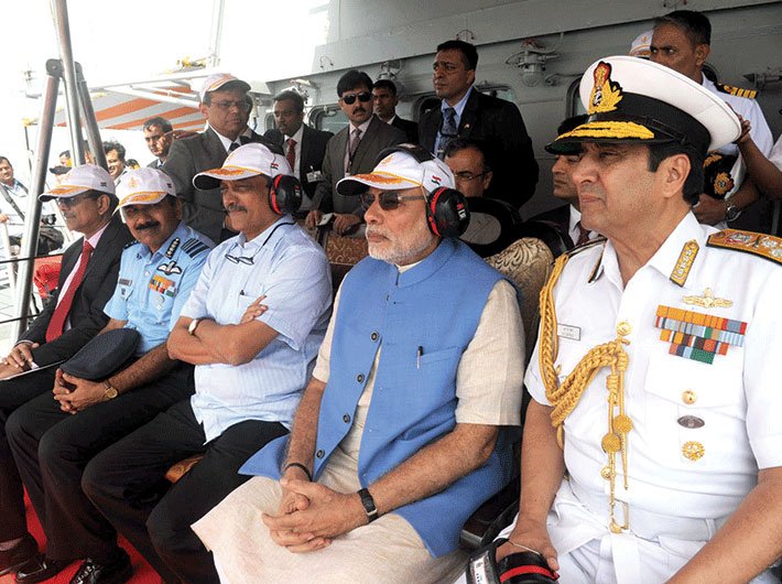 PM Modi witnessing an air-and-naval show aboard INS Vikramaditya, on December 15, 2015, after attending the annual Combined Commanders Conference – held on board an aircraft carrier for the first time