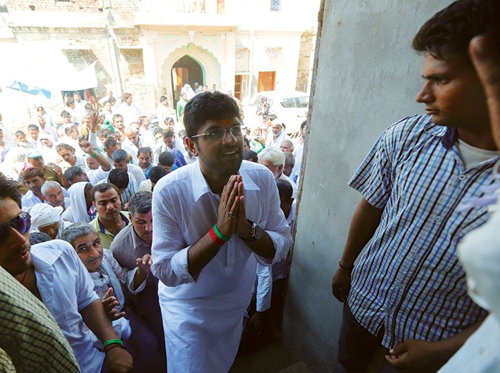 Dushyant Chautala campaigning at Uchana Kalan in Jind from where he is fighting the election.