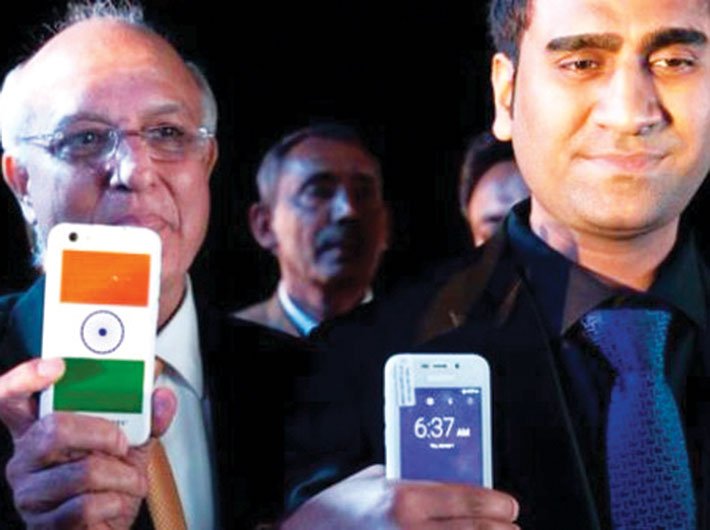 Ringing Bells president Ashok Chaddha (left) and managing director Mohit Goel launching Freedom 251 in New Delhi