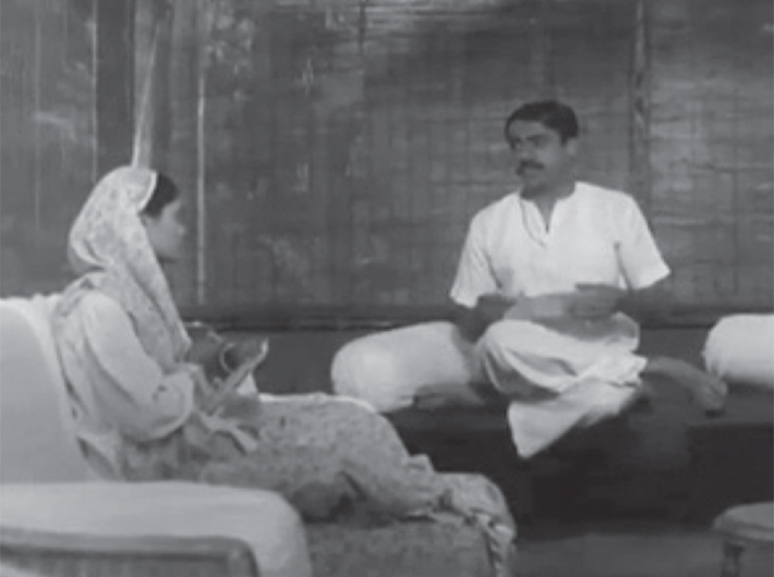 Gandhi reads out to Kasturba a letter, a still from Benegal`s `The Making of the Mahatma` featuring Rajit Kapur and Pallavi Joshi