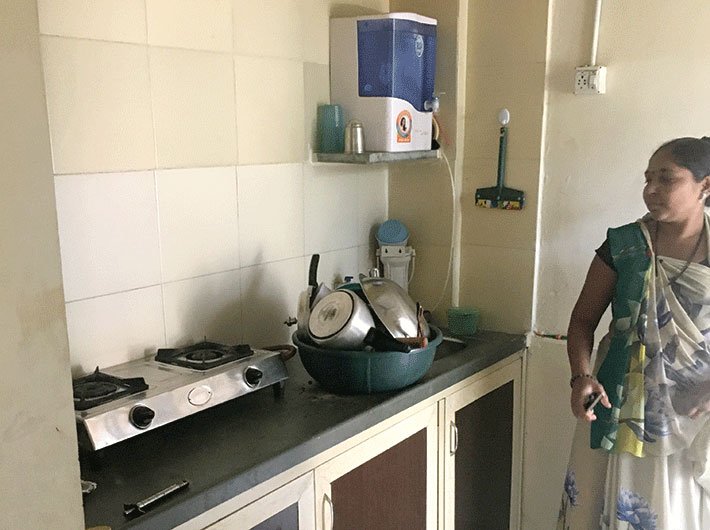 Hetalben Patel in her spanking kitchen at the Shantapura colony
