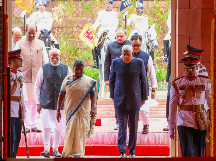 President Droupadi Murmv with vice president Jagdeep Dhankhar and PM Narendra Modi arriving for the joint session of parliamenton Thursday