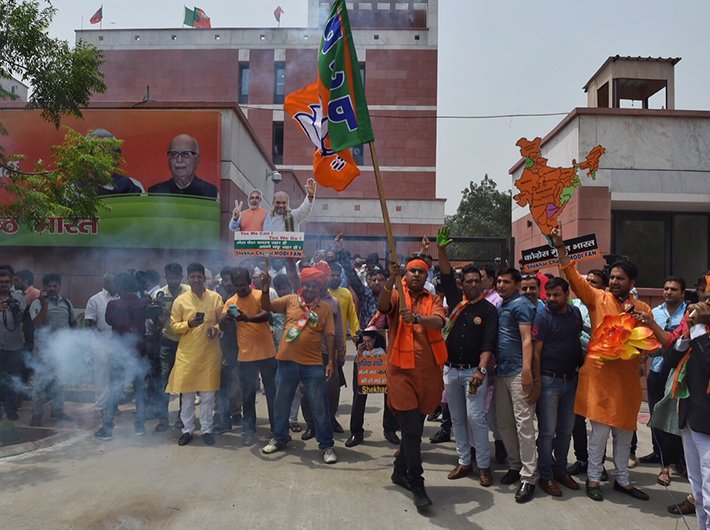 BJP supporter celebrating Karnataka assembly results in Delhi. Photo: Arun Kumar