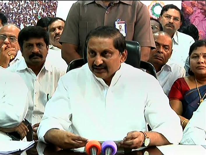 Kiran Kumar Reddy addresses the media with several cabinet colleagues and fellow legislators in Hyderabad on Wednesday afternoon after resigning as the Andhra Pradesh CM.