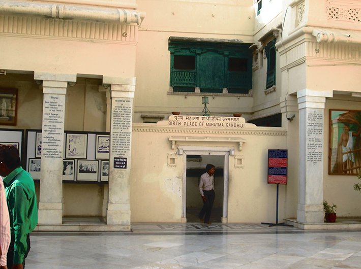 The three-storey structure of Gandhi’s birth place still retains its old charm with its green jharokhas