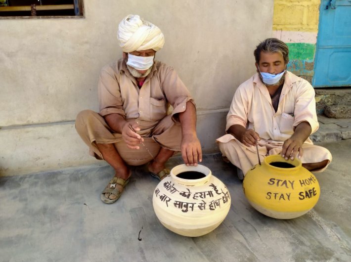 Rural potters in Rajasthan spread the message of precaution against Covid-19 as part of a KVIC campaign. 