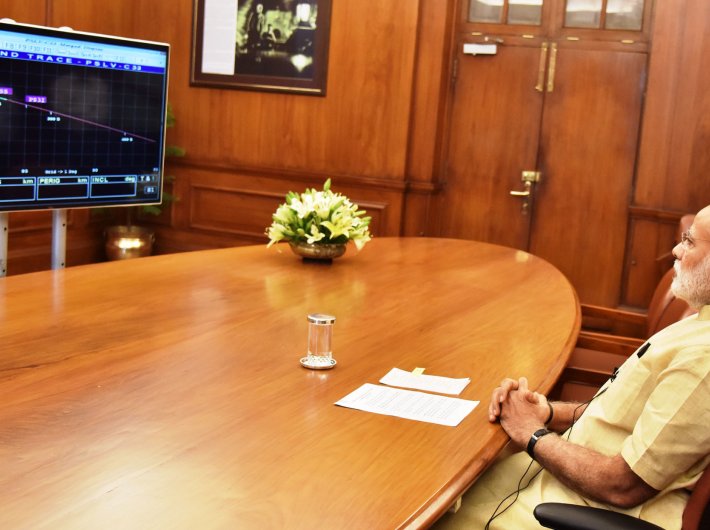 Prime minister Narendra Modi watches telecast of the launch of the IRNSS-1G on Thursday