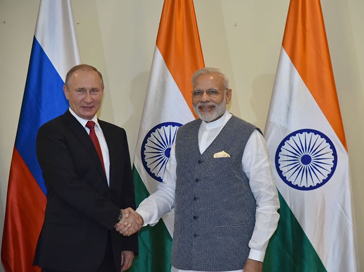 PM Narendra Modi with the Russian president Vladimir Putin ahead of the restricted talks between the two nations, in Goa on October 15