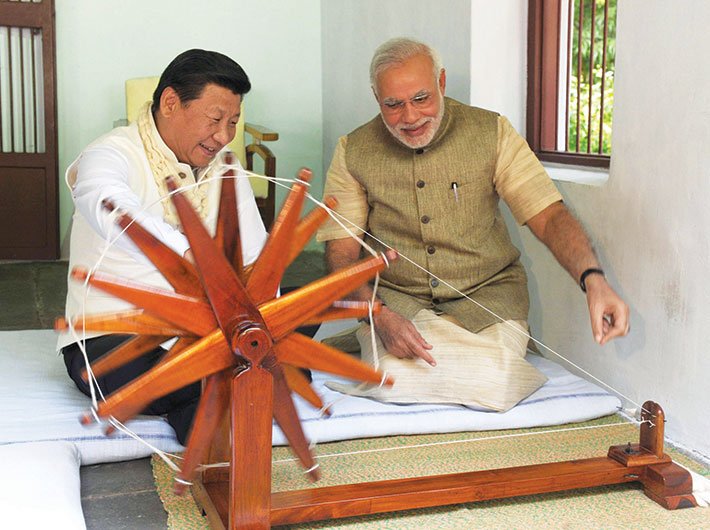 Narendra Modi shows Xi Jinping how to work the spinning wheel at the Sabarmati Ashram in Ahmedabad during the Chinese president`s recent visit to India.