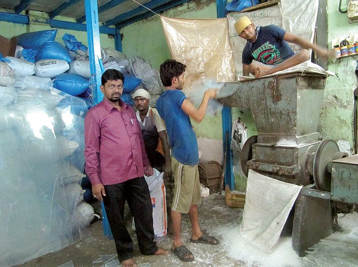 Khwaja Qureshi at his plastic recycling unit in Dharavi, Mumbai