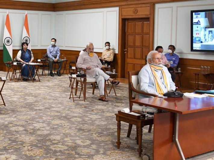 PM Modi with home minister Amit Shah and health minister Dr Harsh Vardhan during the video conferencing with the chief ministers on Monday.