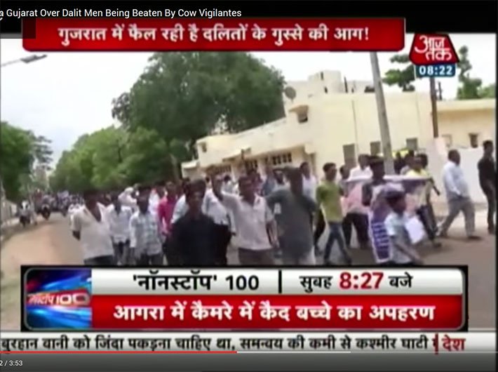A TV grab of Aaj Tak showing protest by dalits in Gujarat