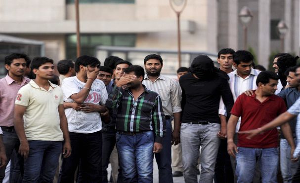 Sreesanth and the other cricketers and bookies after their arrest by Delhi Police on charges of spot-fixing.