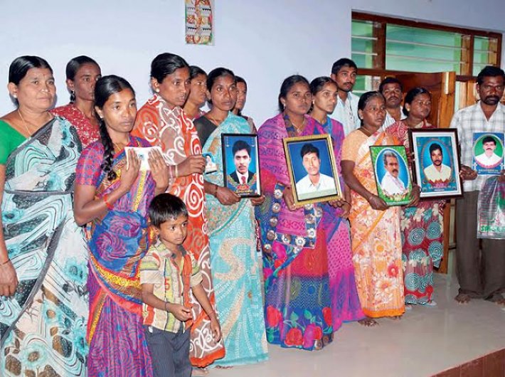 Families of farmers who committed suicide, at Warangal district headquarters.